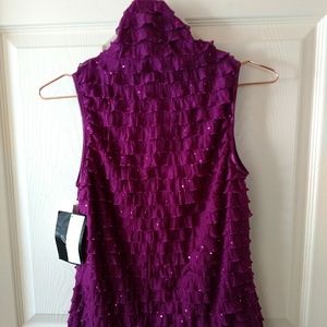 Fuscia turtleneck sleeveless blouse sz S by J.T.B.